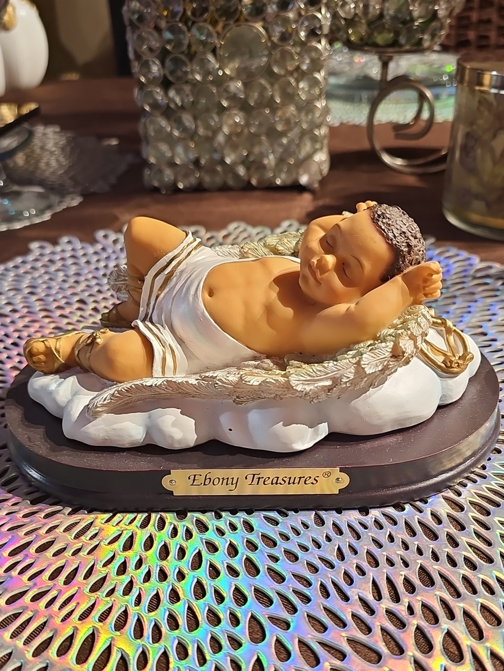 Ebony Treasures Reclining Baby Angel Figurine in Brown and White